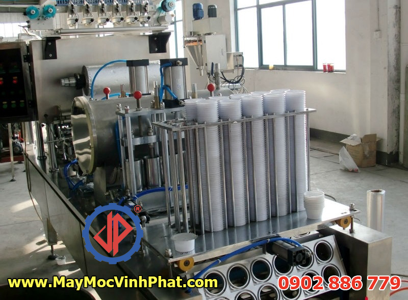 Vĩnh Phát sản xuất dây chuyền máy chiết rót định lượng, dán miệng ly cốc tự động hiện đại, giá rẻ